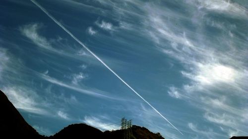 Low angle view of vapor trail in sky