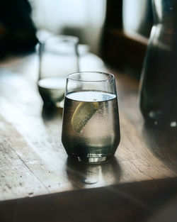 Close-up of beer glass on table