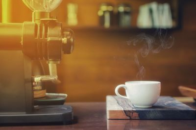 Close-up of coffee cup on table