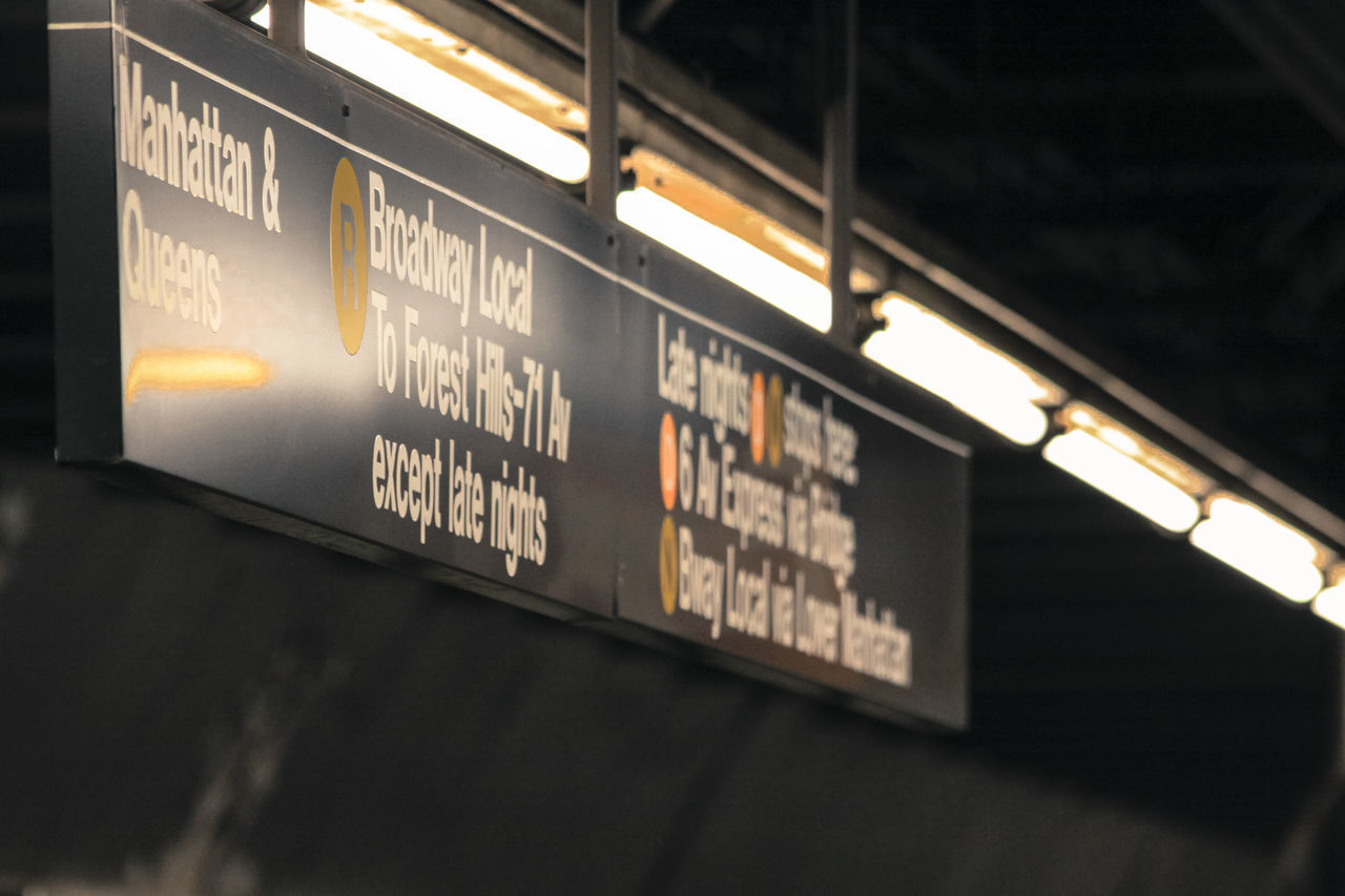 CLOSE-UP OF INFORMATION SIGN ON BUS