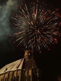 Low angle view of firework display