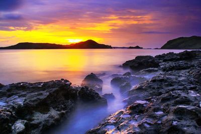 Scenic view of sea against sky during sunset