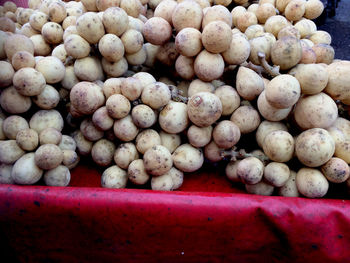 Close-up of onions for sale at market stall