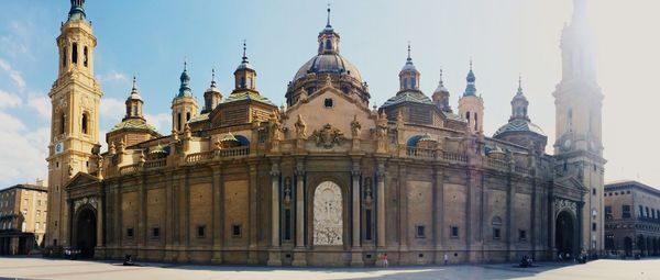 Facade of historic building against clear sky