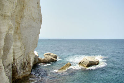 Scenic view of sea against clear sky