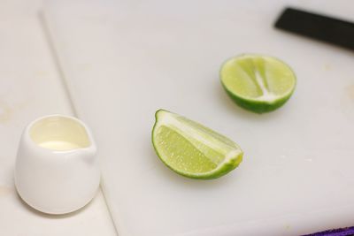 High angle view of green fruits on table