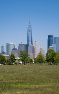 View of buildings in city against clear sky