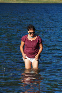 Woman standing in lake