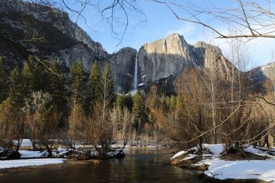 Rocky mountains and trees by merced river