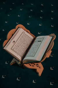 High angle view of book on table