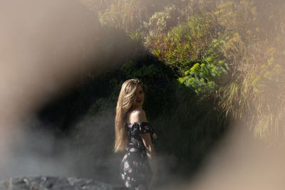 Woman standing in water