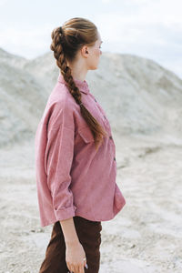 Woman standing on beach