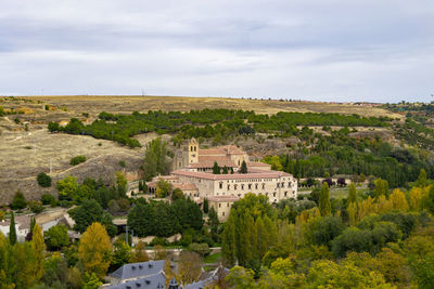 High angle view of buildings in city against sky