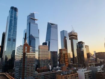 Sunrise view out of window of hudson yards, new york city