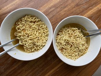 2 bowls of instant noodle indomie in cold weather