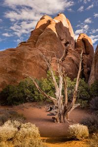 Rock formation on land against sky