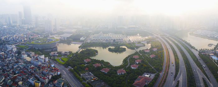 High angle view of city buildings against sky