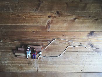 People standing on wooden floor