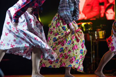 Low section of women dancing on stage