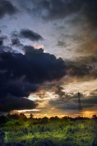 Scenic view of dramatic sky over land
