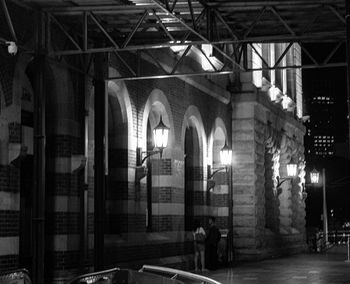 Illuminated buildings in city at night