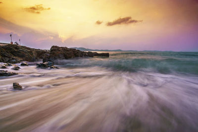 Scenic view of sea against sky during sunset