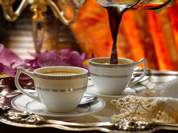Close-up of coffee served on table