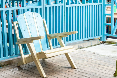 Empty chairs and tables at porch