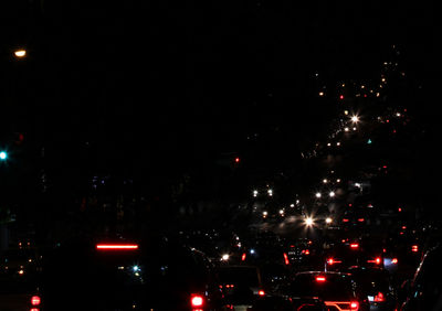 View of illuminated city at night