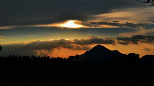 Scenic view of mountains during sunset