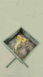 High angle view of bananas on tiled floor