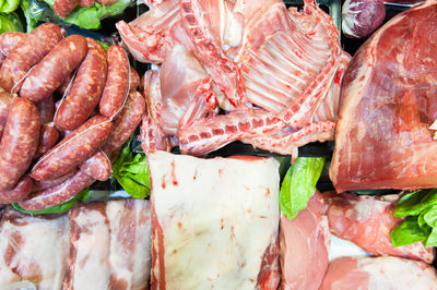 Directly above view of processed meats at market stall