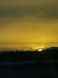 Scenic view of dramatic sky during sunset