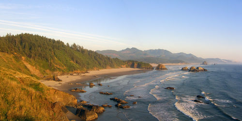 Scenic view of sea and mountains at ecola state park 