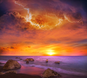 Scenic view of sea against sky during sunset