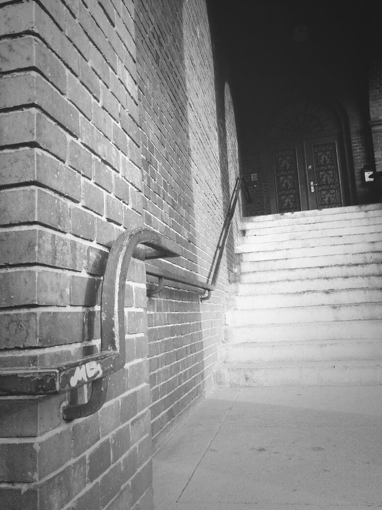 architecture, built structure, building exterior, wall - building feature, the way forward, building, brick wall, steps, arch, empty, indoors, door, entrance, absence, sunlight, day, wall, staircase, cobblestone, railing