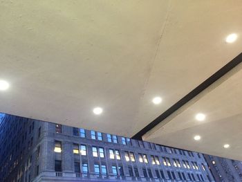 Low angle view of illuminated building at night