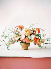 Close-up of flower bouquet against white background