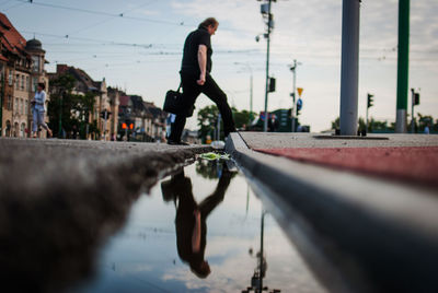 Reflection of woman in water