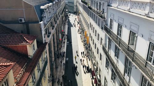 High angle view of street amidst buildings in city