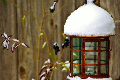 Close-up of birdhouse on snow