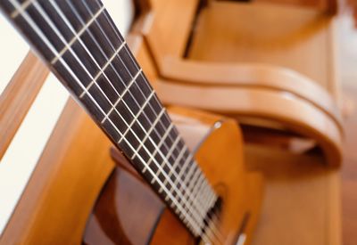 Close-up of guitar at home