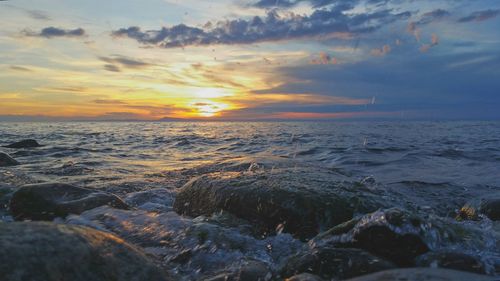 Scenic view of sea against sky during sunset