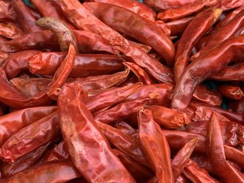 Full frame shot of red chili peppers for sale in market