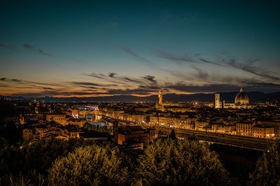High angle view of illuminated city at night