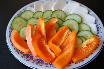 High angle view of chopped vegetables in bowl on table