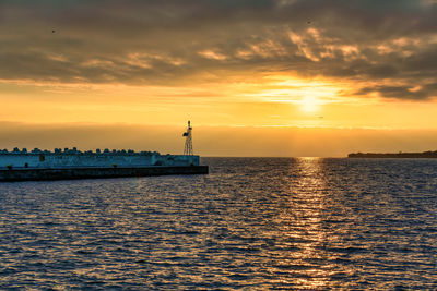 Scenic view of sea against sky during sunset