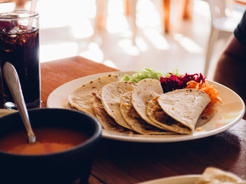 Close-up of tacos served in plate