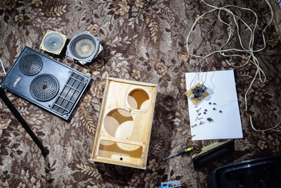 High angle view of old camera on table