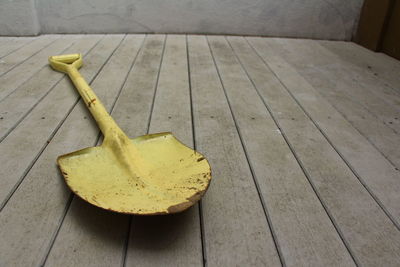 High angle view of leaf on wooden floor at home